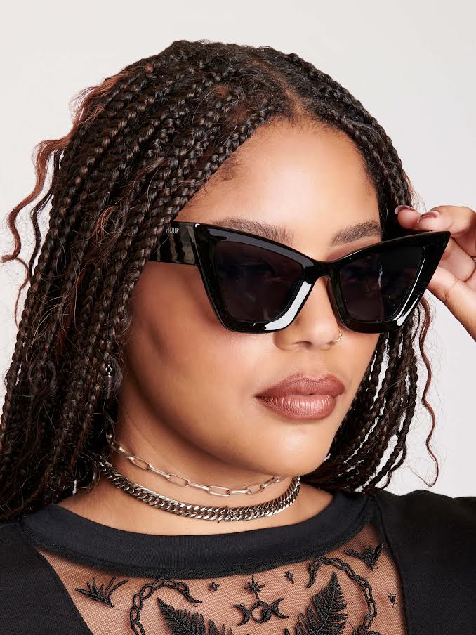 Black cat eye sunglasses with midnight hour logo