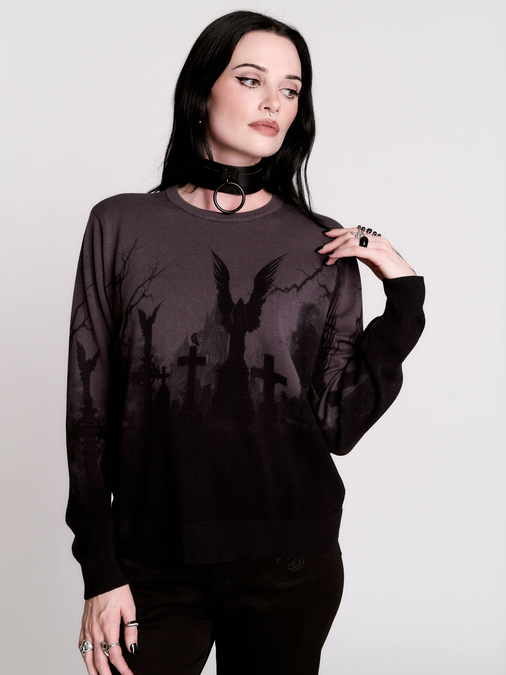 cemetery silhouette and a winged angel statue—spans the chest and sleeves, with a moody light charcoal ombré fade into deep black.