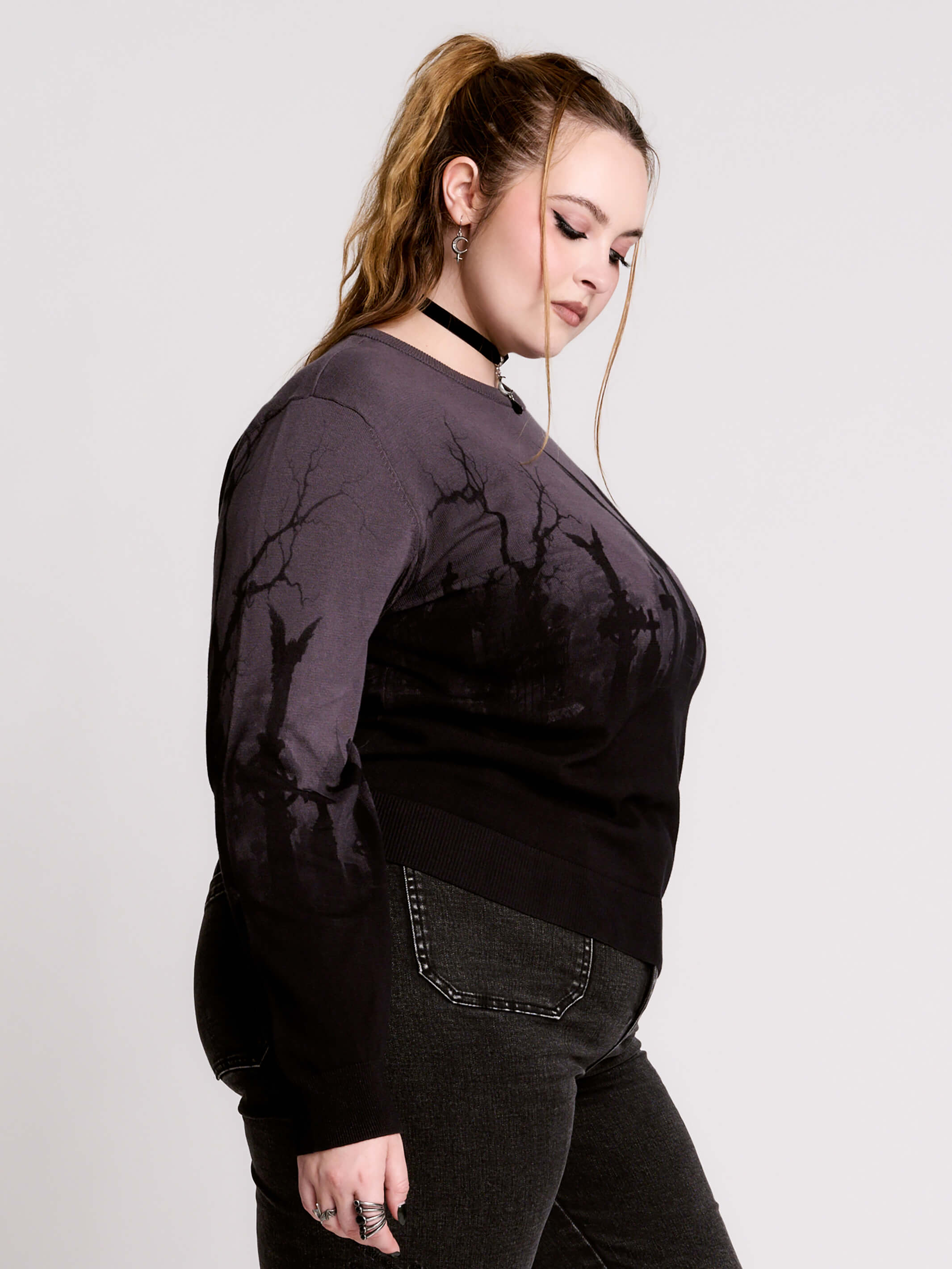 cemetery silhouette and a winged angel statue—spans the chest and sleeves, with a moody light charcoal ombré fade into deep black.
