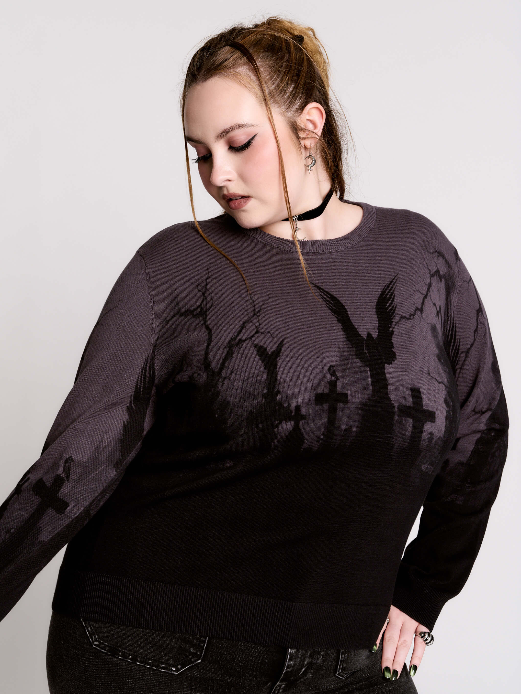 cemetery silhouette and a winged angel statue—spans the chest and sleeves, with a moody light charcoal ombré fade into deep black.