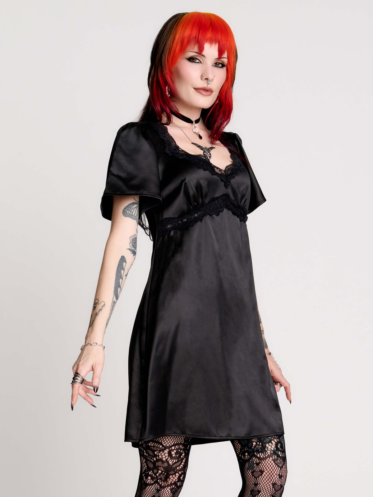 black satin short-sleeve dress with lace trim