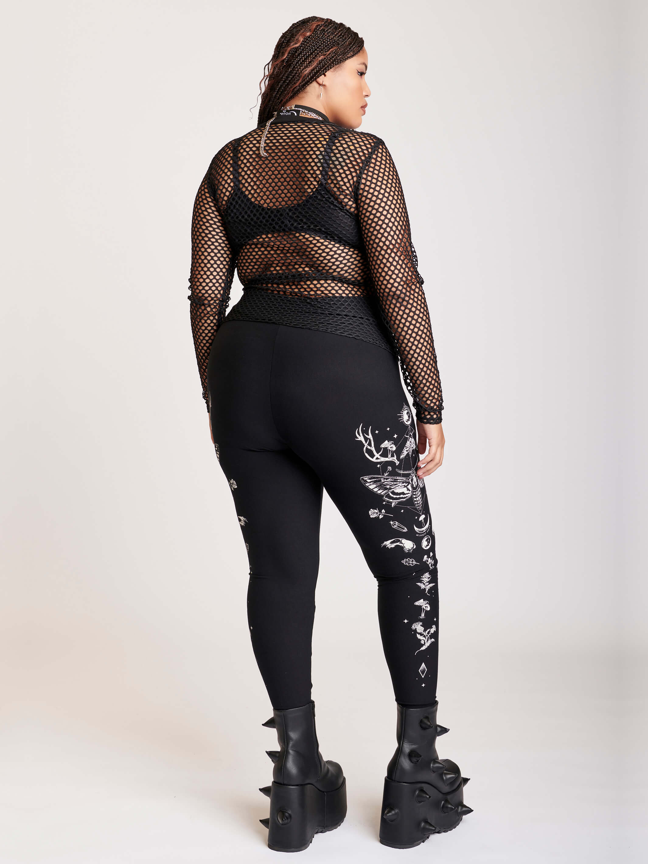 Black legging with death moth and forest findings graphics down sides