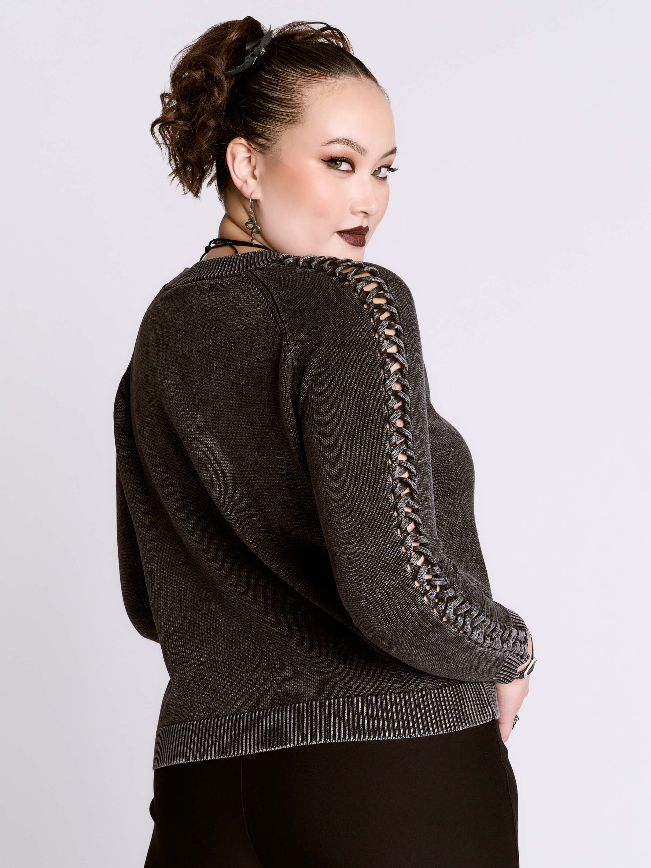 distressed braided sweater