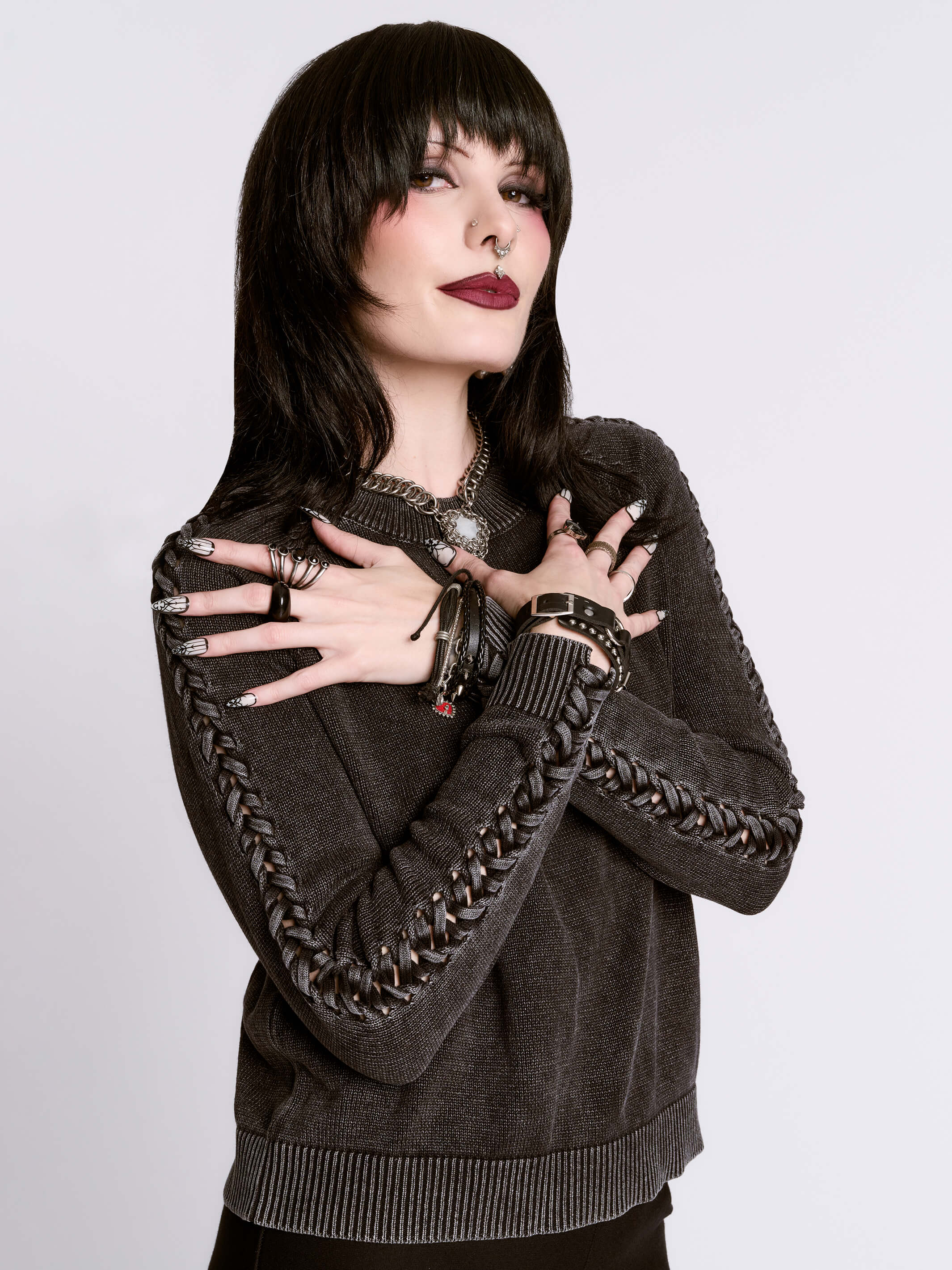 DISTRESSED BRAIDED SWEATER