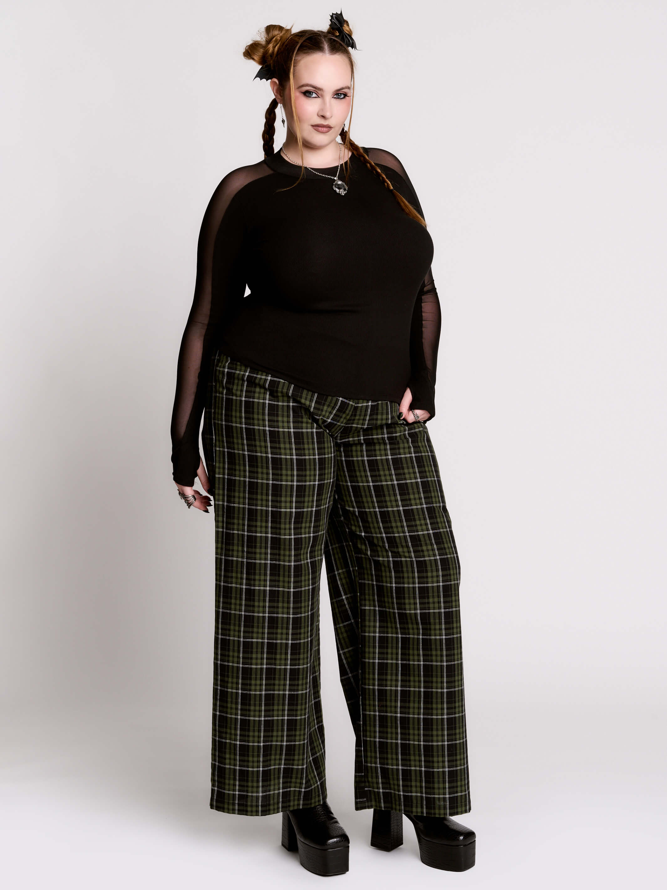 black long-sleeve top with sheer mesh sleeves
