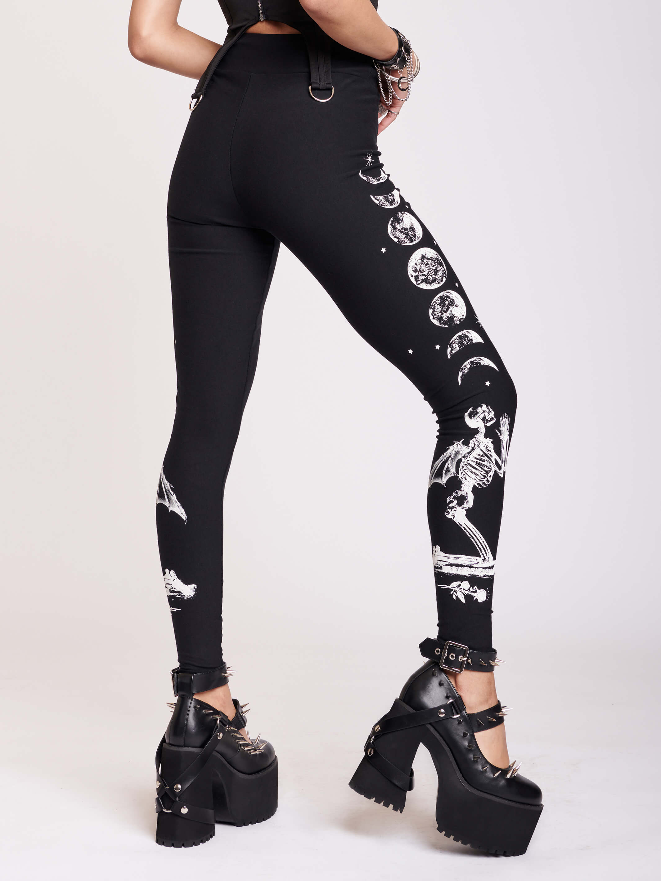 BLACK LEGGING WITH WHITE GRAPHIC FEATURING PRAYING SKELTONAND MOON PHASE
