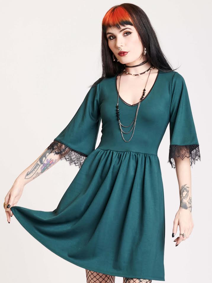Green dress with black lace trim 