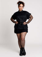 a black short-sleeve button-front shirt dress with a matching double-buckle front waist details.