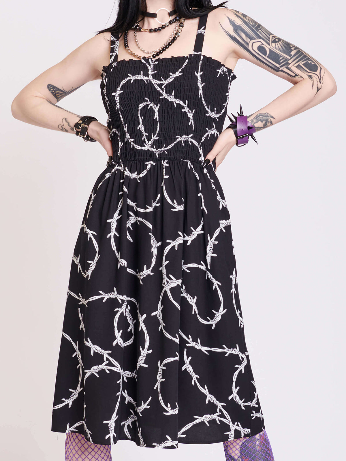 Smocked sundress with barb wire all over print