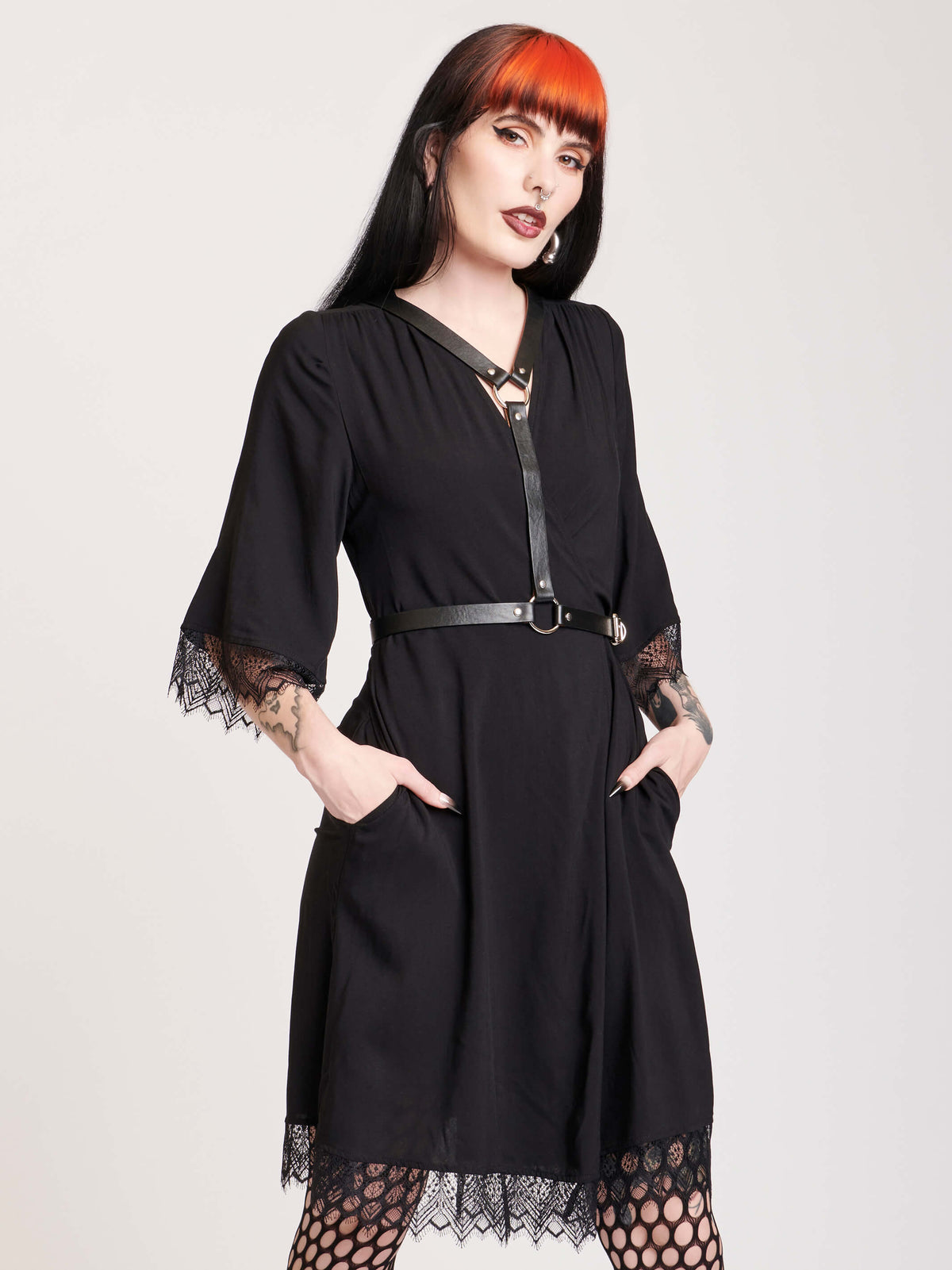 wrap dress wuth lace trim on arms and hem