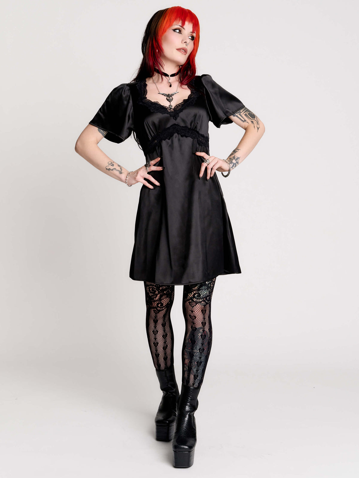 black satin short-sleeve dress with lace trim