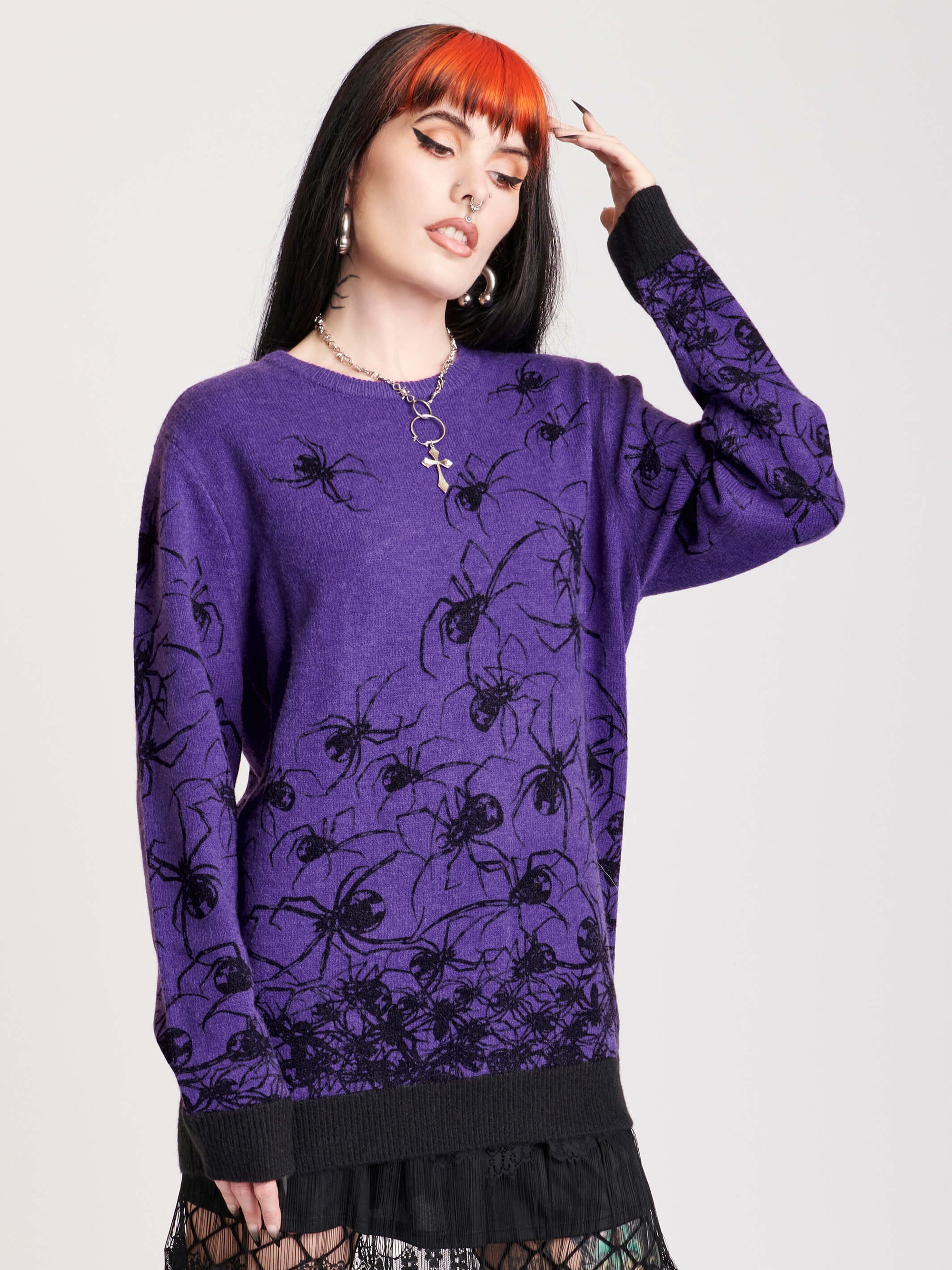 purple and black spider sweater