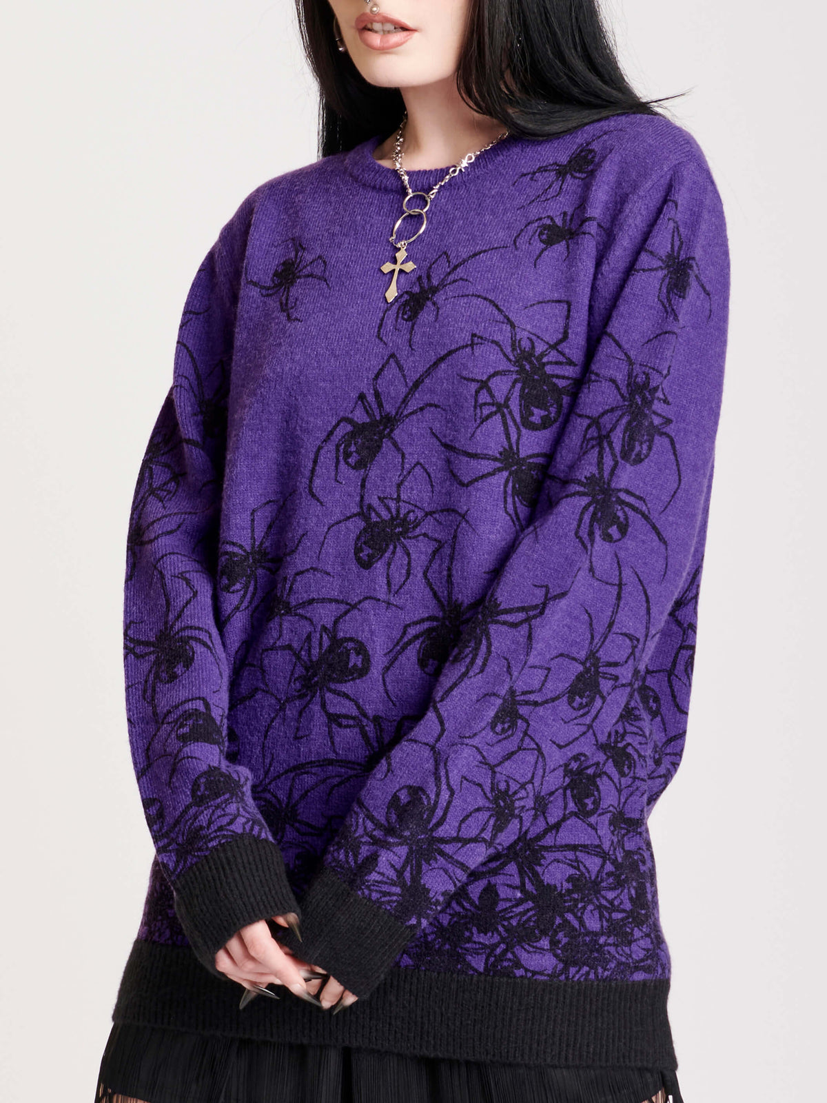 purple and black spider sweater