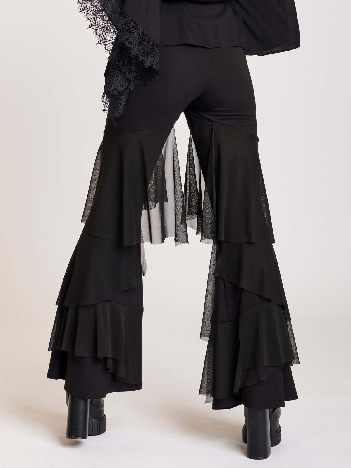 Palazzo pants with mesh panel layers from mid thigh down