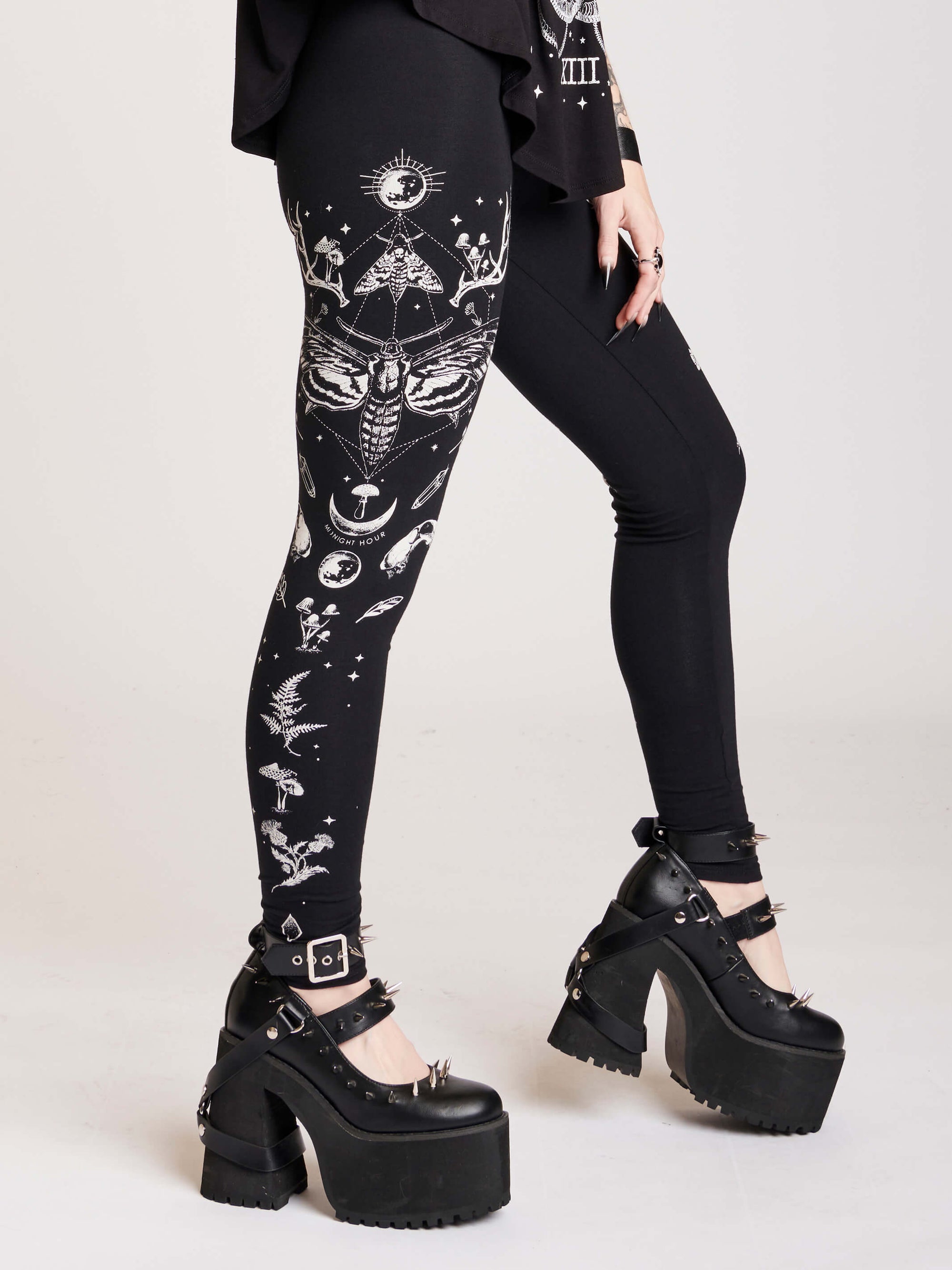 Black legging with death moth and forest findings graphics down sides