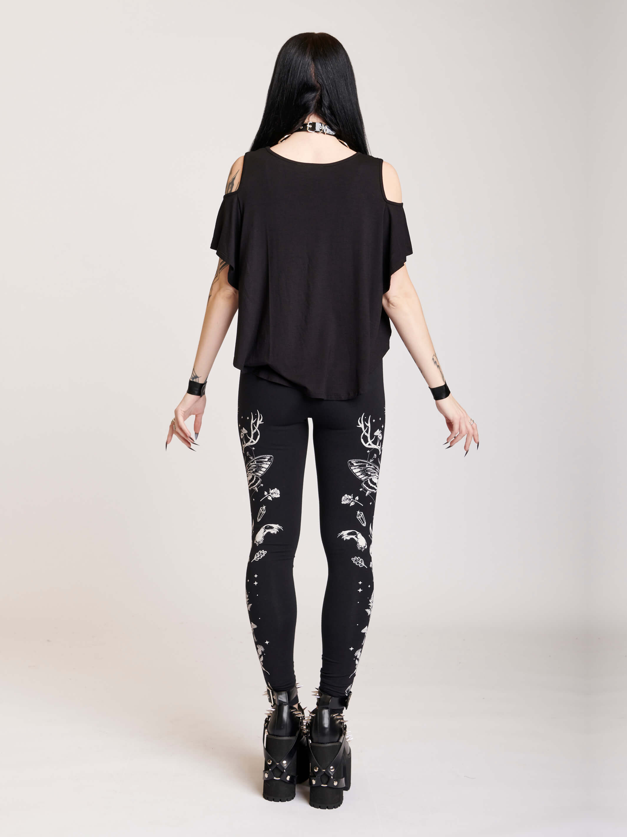 Black legging with death moth and forest findings graphics down sides
