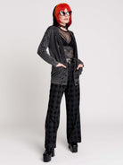 a dark gray textured cardigan with braided details