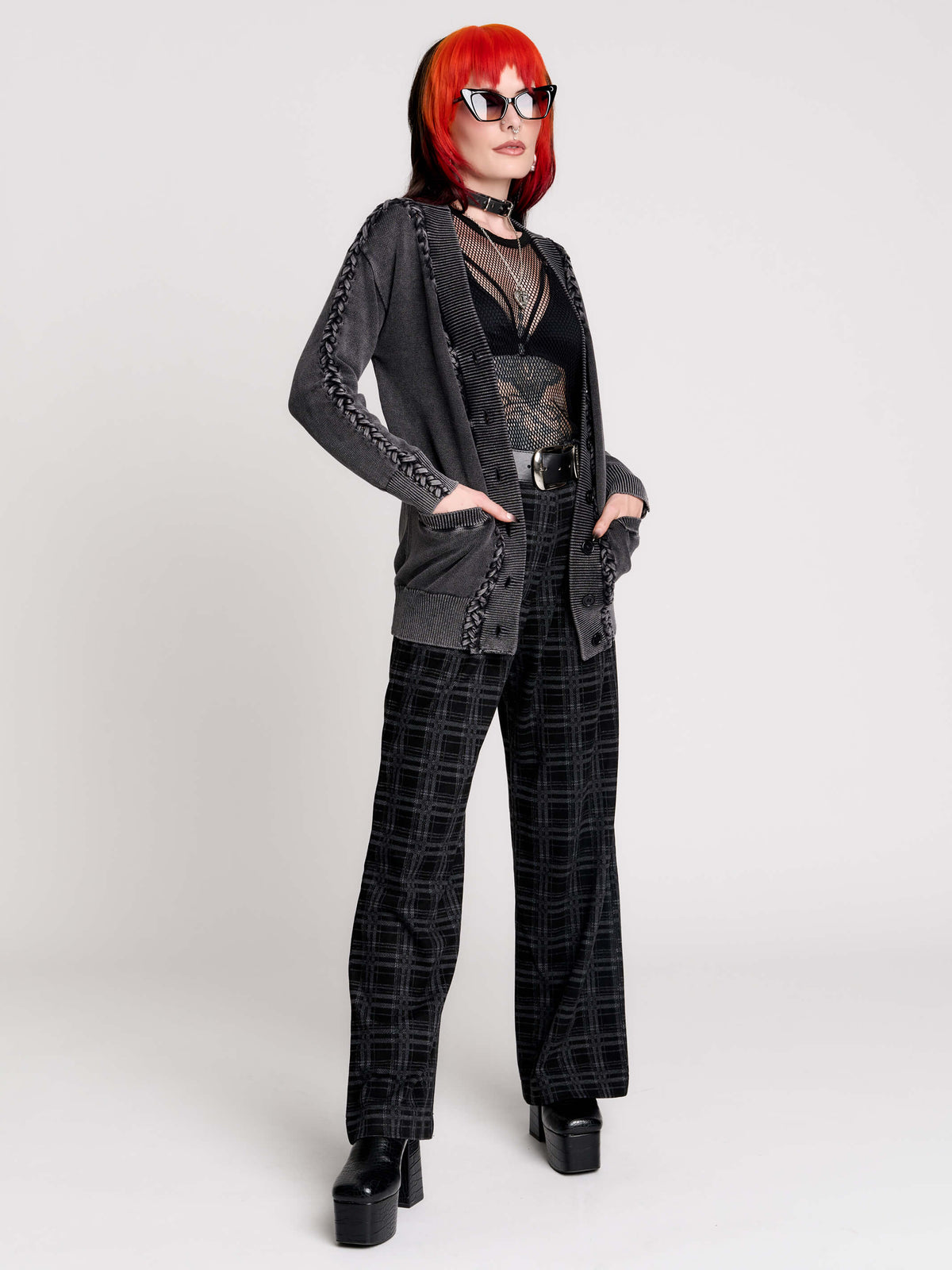 a dark gray textured cardigan with braided details