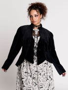black velvet jacket with a black-and-white patterned lining