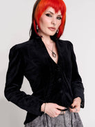 black velvet jacket with a black-and-white patterned lining