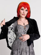 black velvet jacket with a black-and-white patterned lining