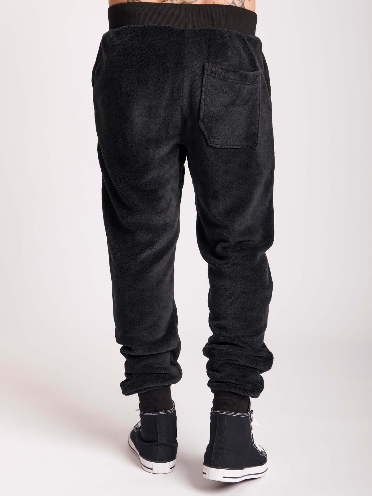 black jogger with embroidered patches