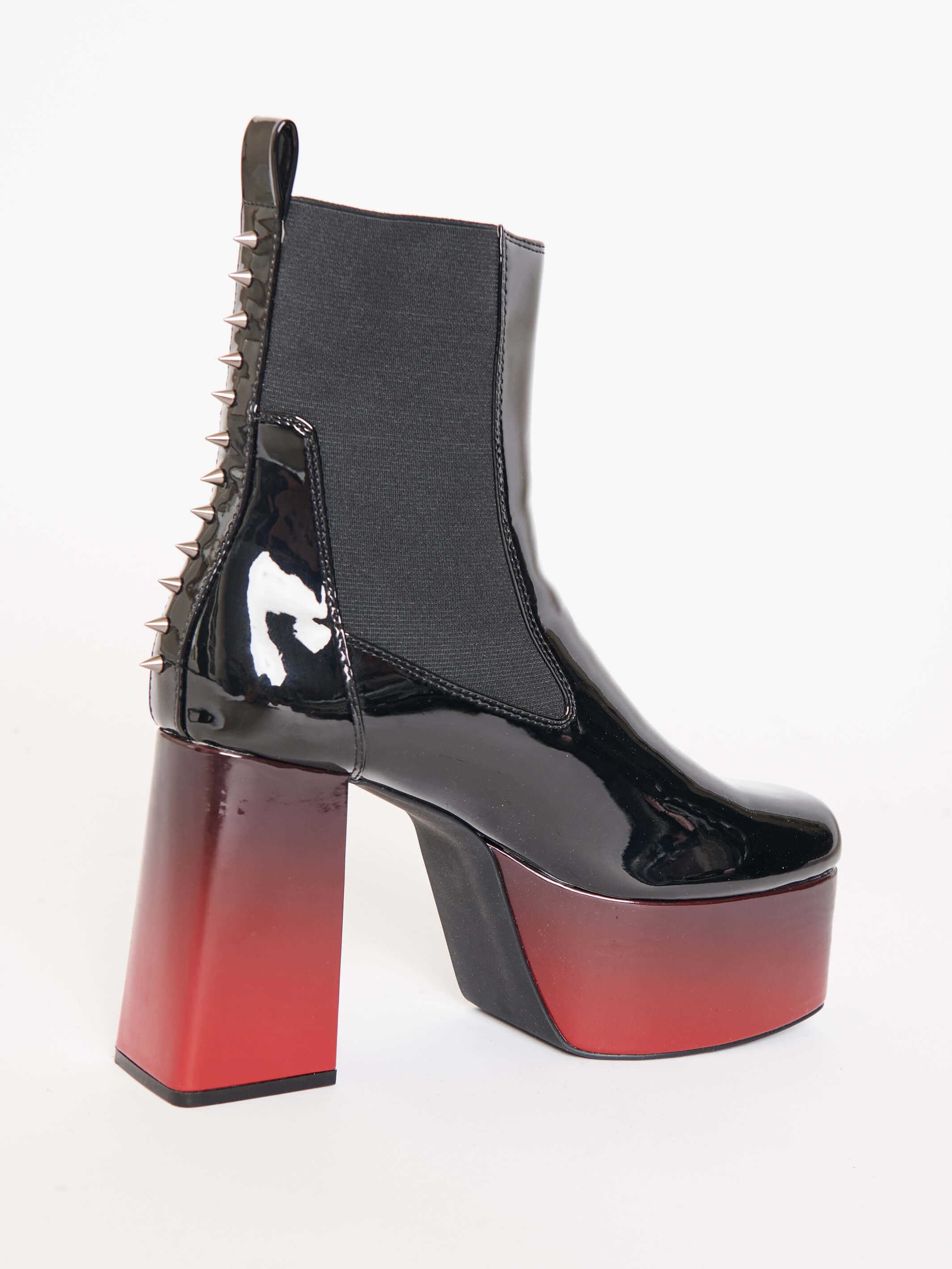 ombre red and black vegan patent leather platform boots with spikes down the back