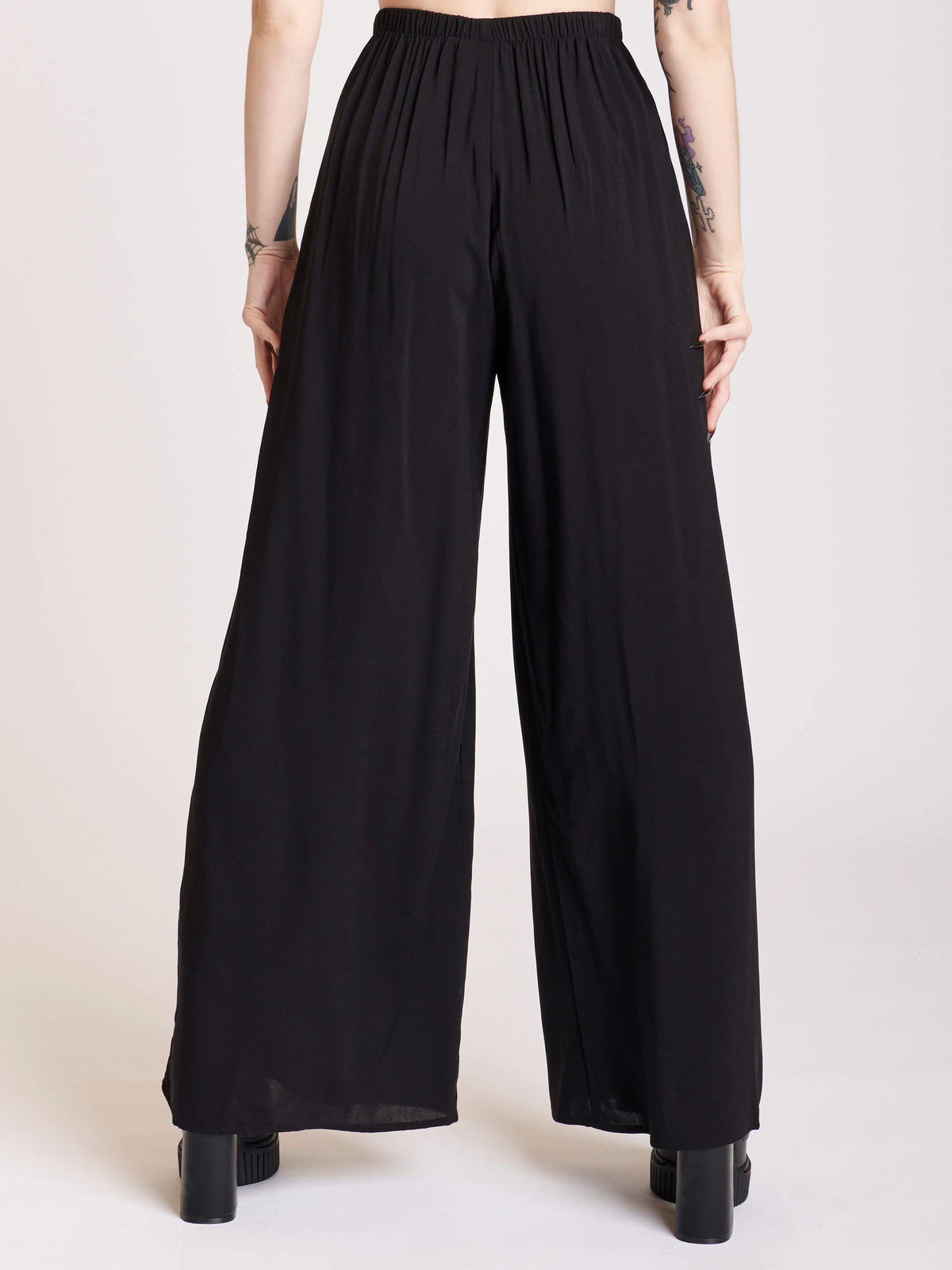 Black palazzo pants with sode lace panels
