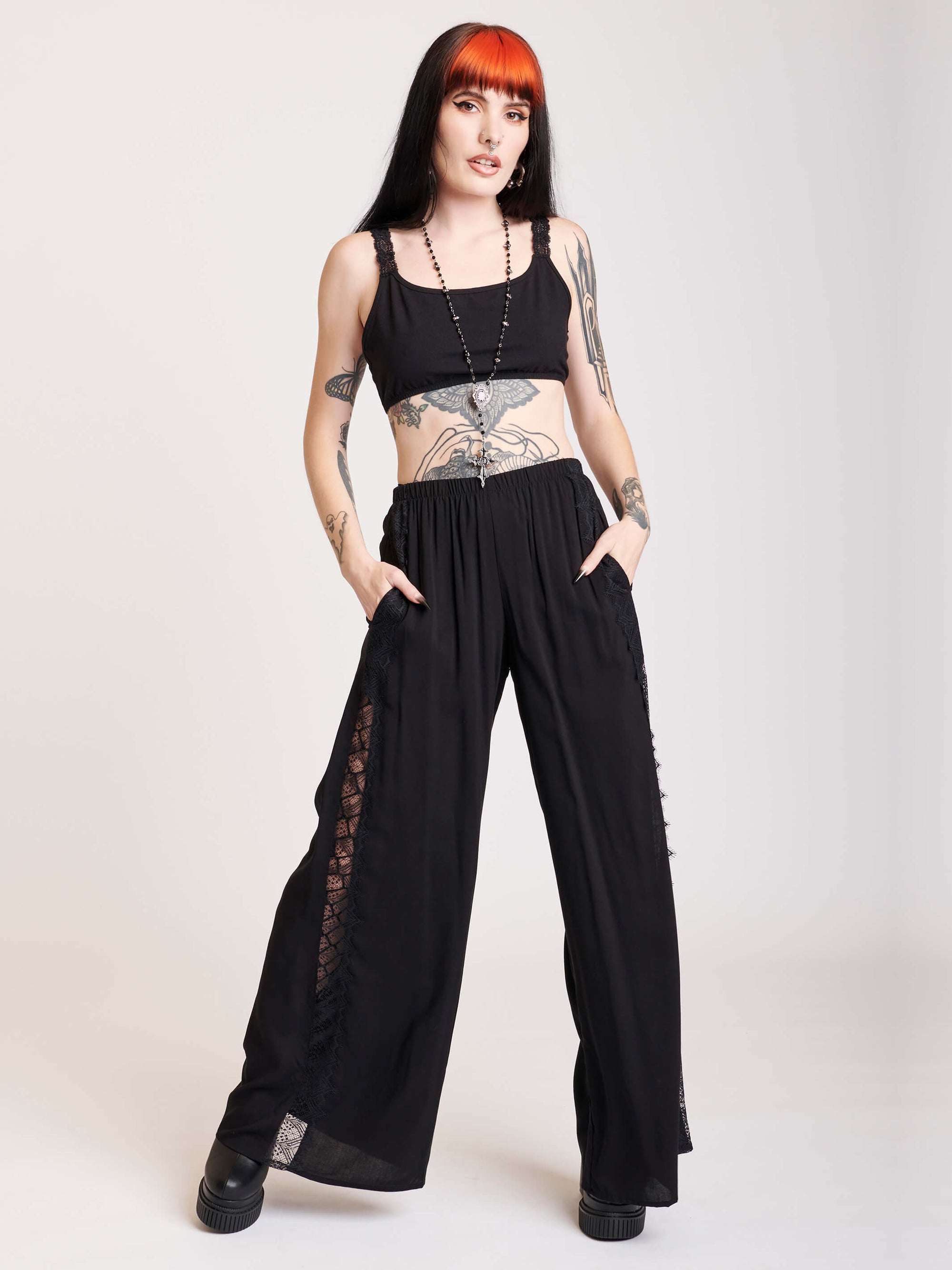 Black palazzo pants with sode lace panels
