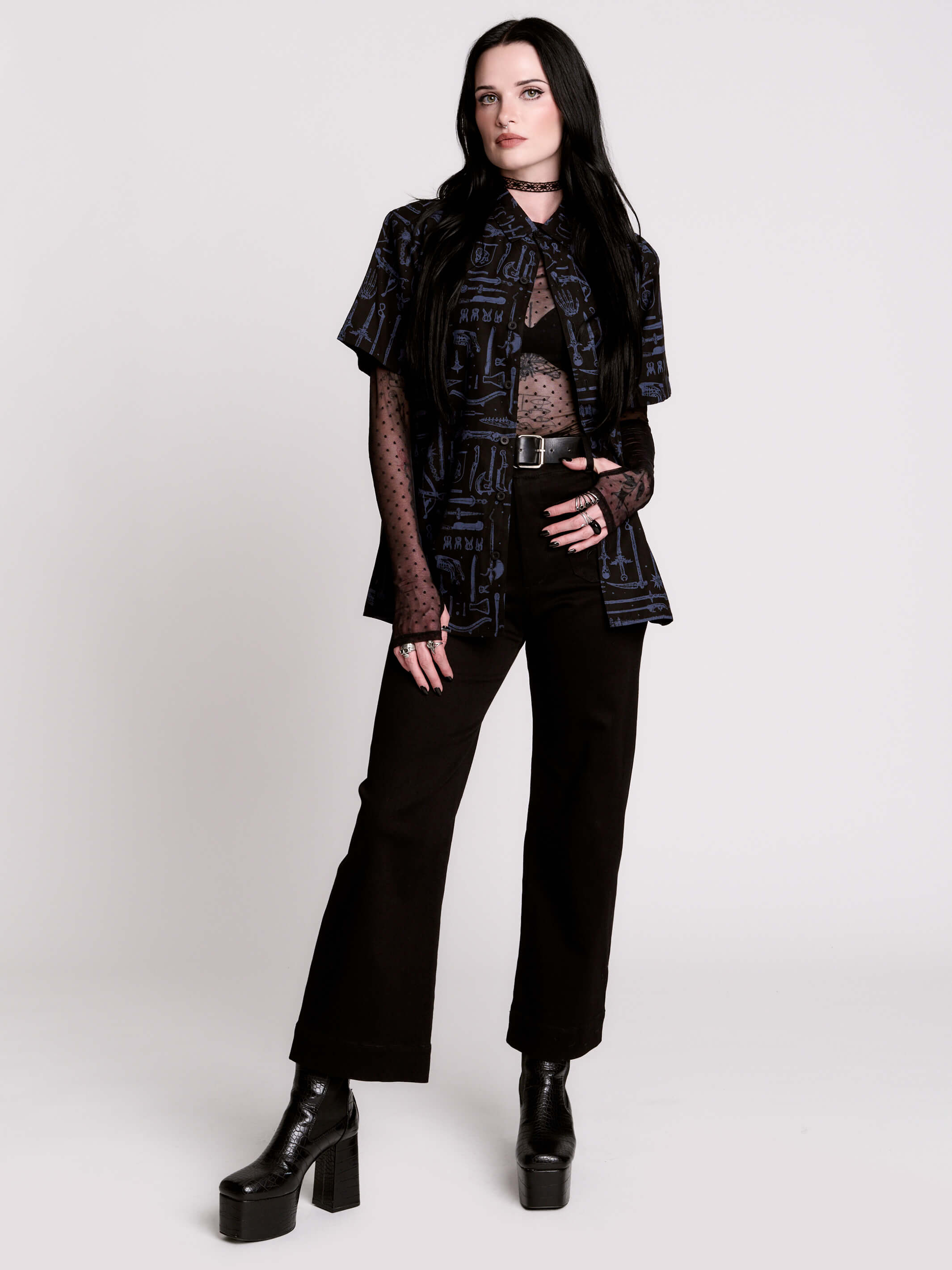short-sleeve button-down that mixes crisp classic shirting with dark, gothic illustration. 