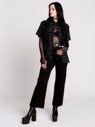 short-sleeve button-down that mixes crisp classic shirting with dark, gothic illustration. 