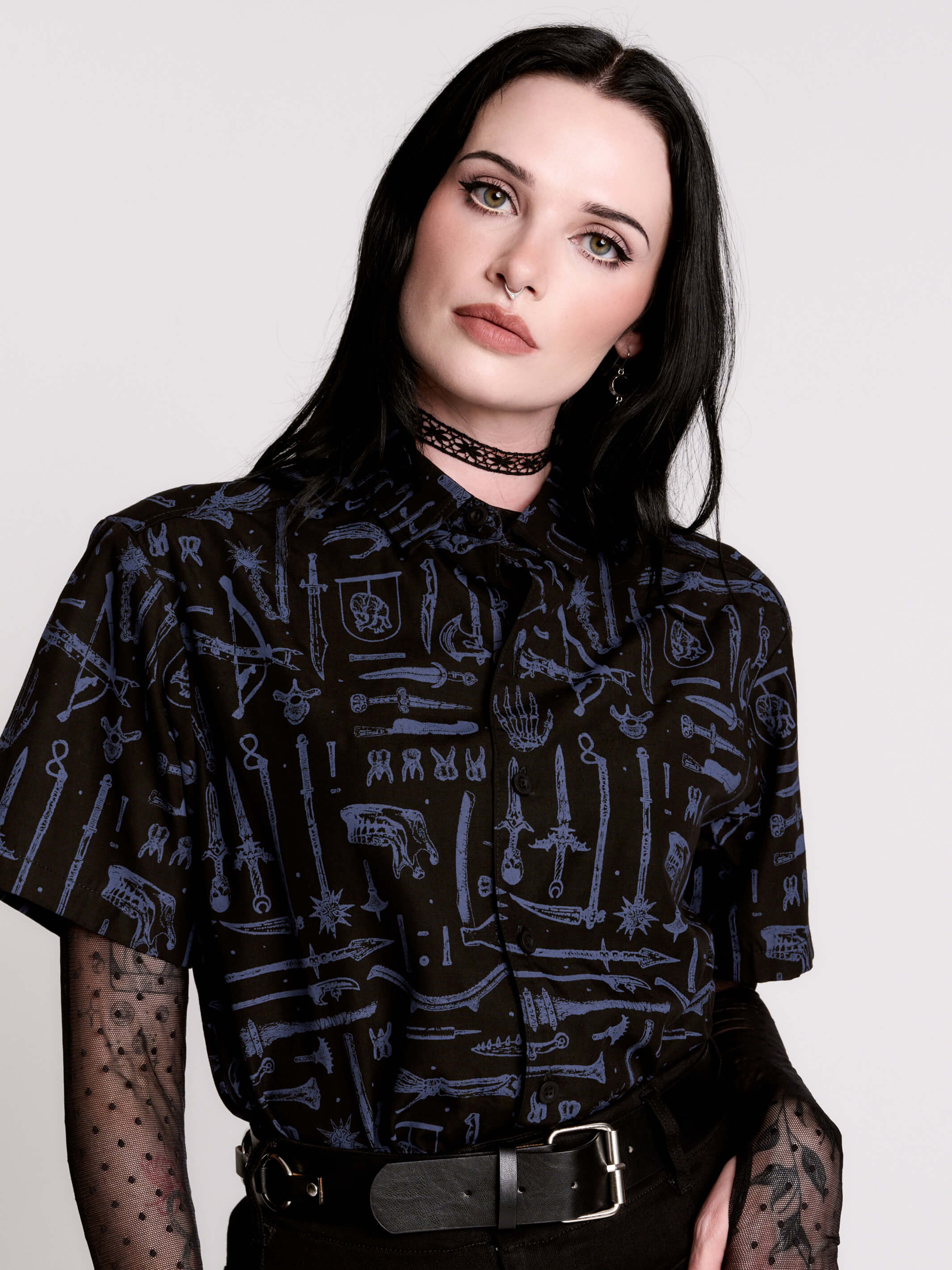 short-sleeve button-down that mixes crisp classic shirting with dark, gothic illustration. 