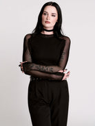  black long-sleeve top with sheer mesh sleeves