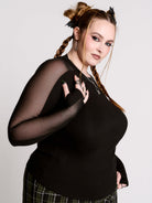 black long-sleeve top with sheer mesh sleeves