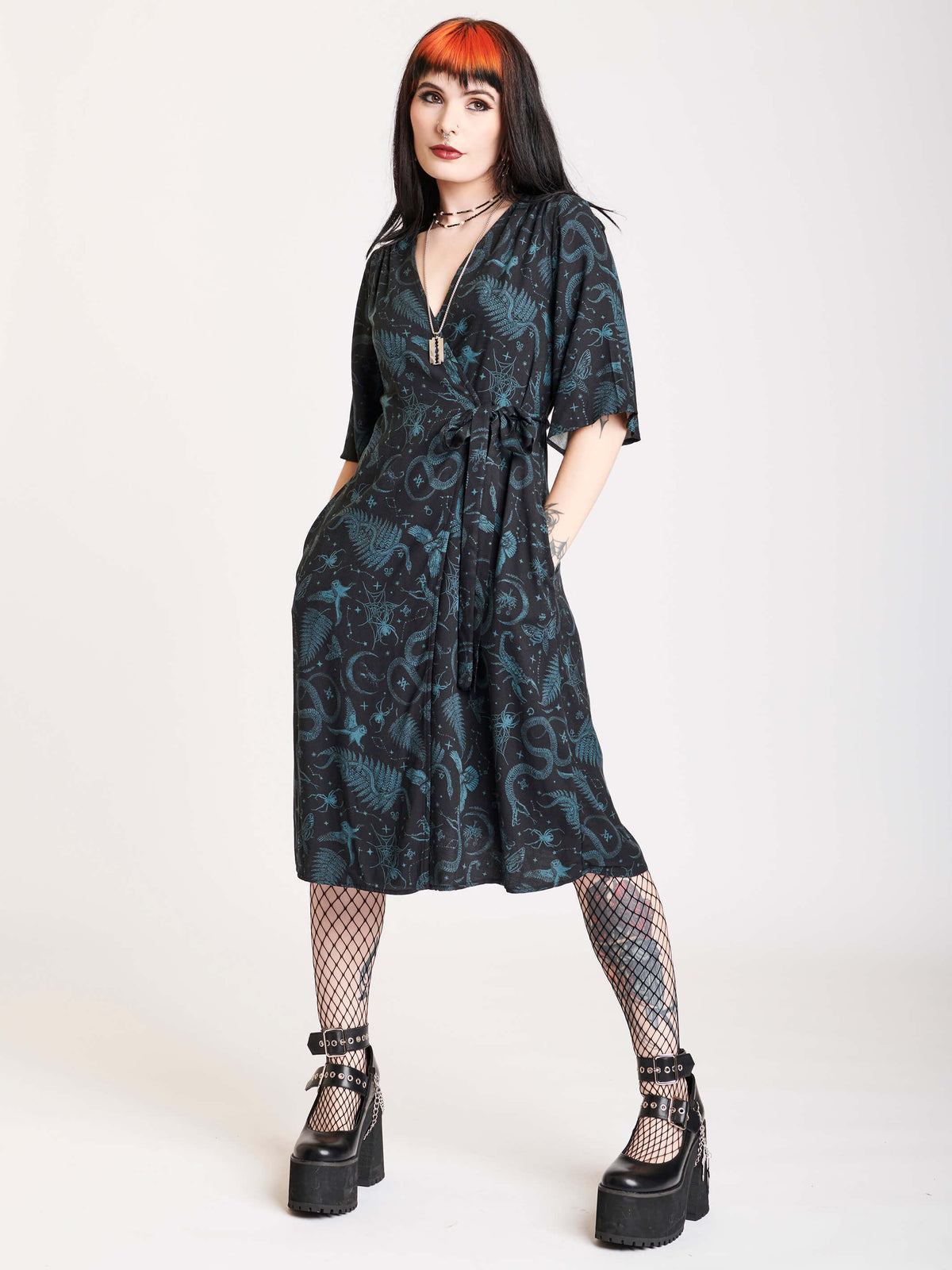 Wrap dress with black and green all over print