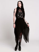 A black sleeveless top with a high mesh neck and an allover gothic-style print featuring silver snakes, moths, ravens and small pink floral accents.