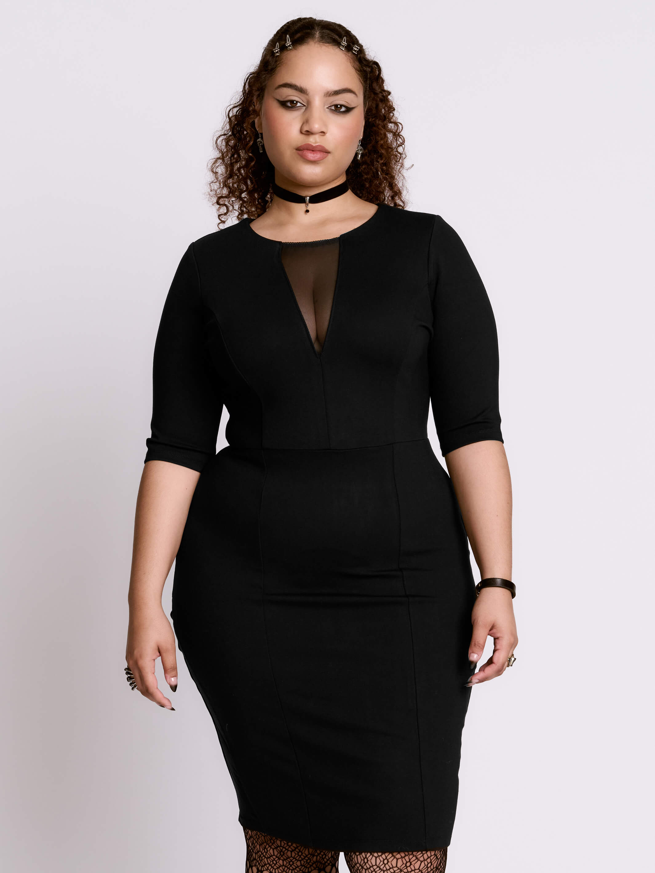 black wiggle dress Unique Vintage Plus Size 1960s Black Criss Cross Halter Penelope Wiggle Dress