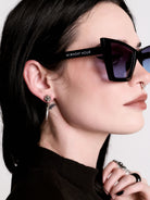 Skull horn earring