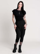 short sleeve top with a softly draped silhouette and a flattering, cinched waist. 