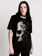 A black t-shirt with a large white skull graphic on the front.