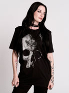 A black t-shirt with a large white skull graphic on the front.