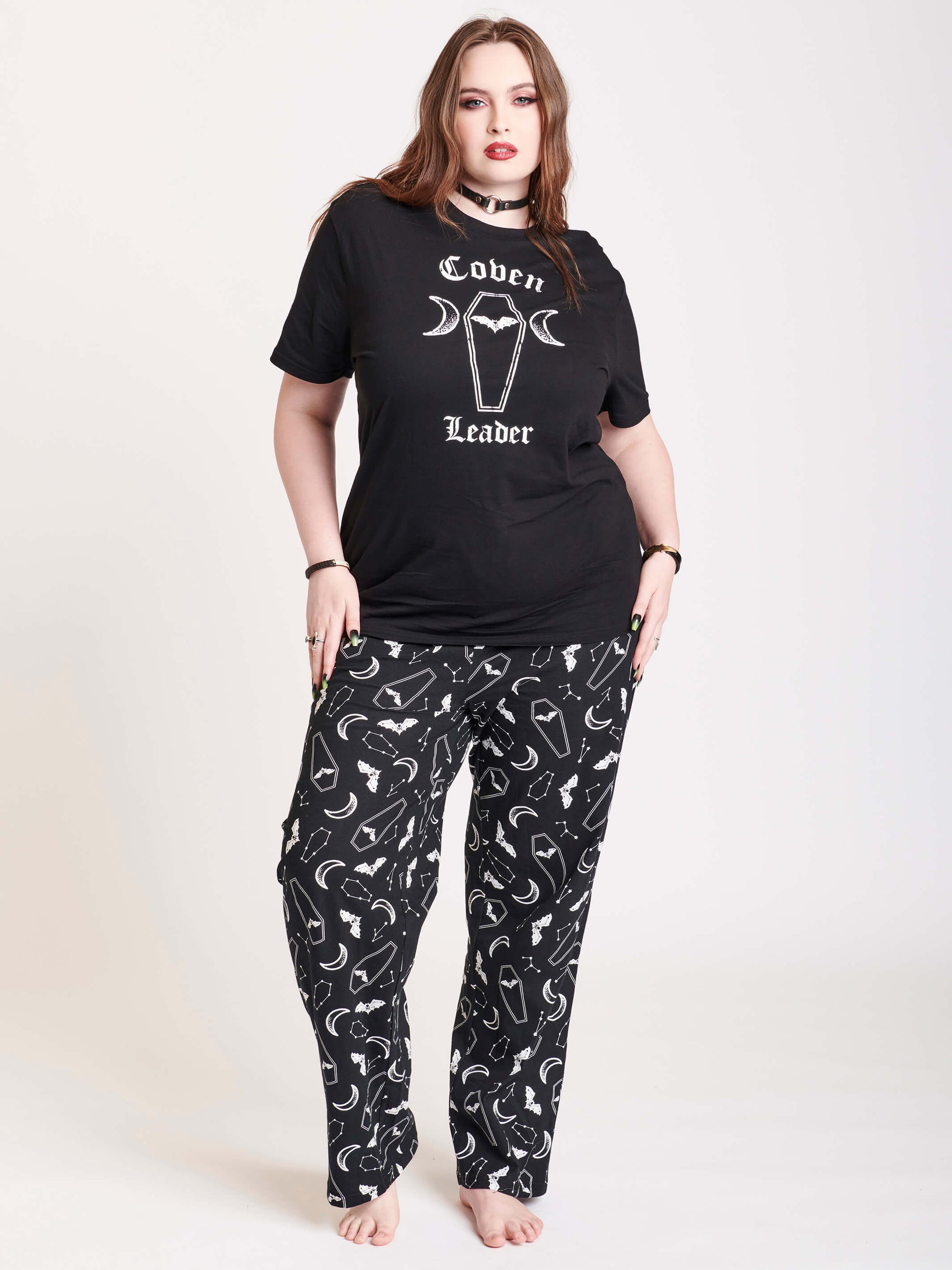 black t-shirt and sleep pants with coffin motif
