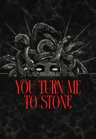 A dark gothic graphic featuring Medusa with snakes for hair, a face beneath, and the red text 'YOU TURN ME TO STONE' on a black marbled background.