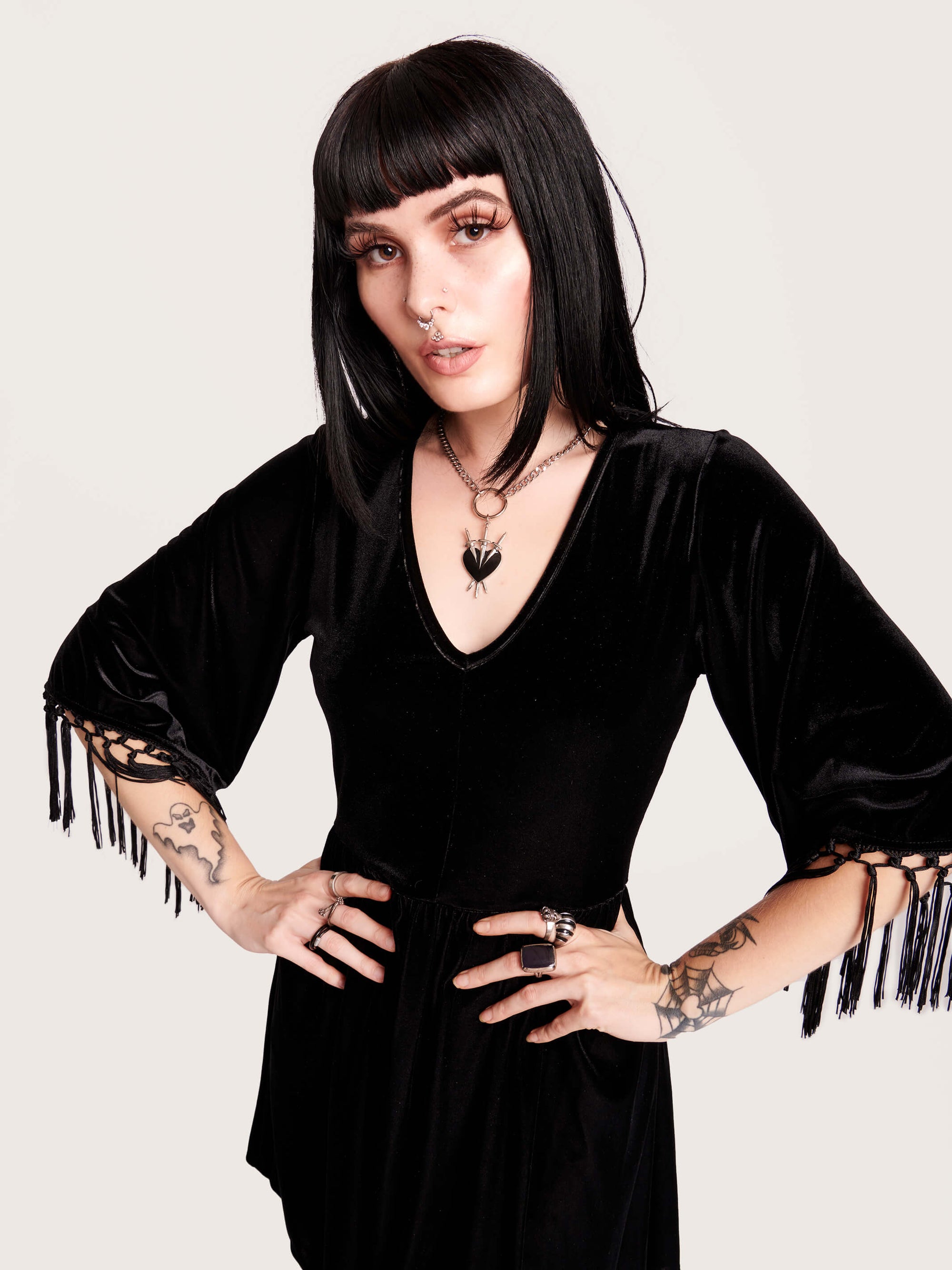 Good witch or bad witch? Day or evening? You decide when you wear our stretch velvet dress with fringe details on the sleeves. Stretch elastic at waist.  Goth grunge fashion, alt girl fashion, goth clothing, gothic dress, black velvet dress, egirl fashion, emo fashion