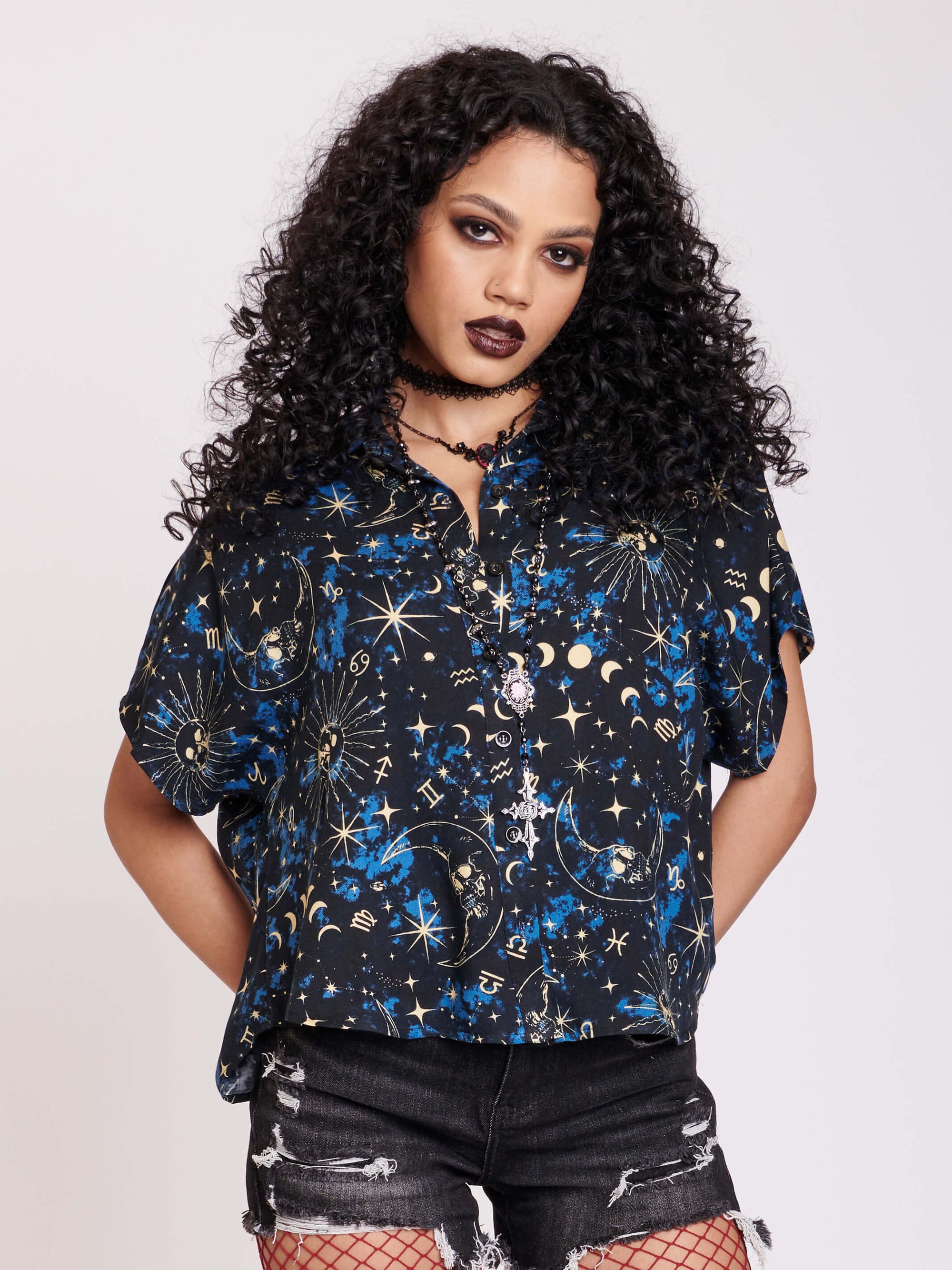 cropped button up top with blue, black and white celestail print