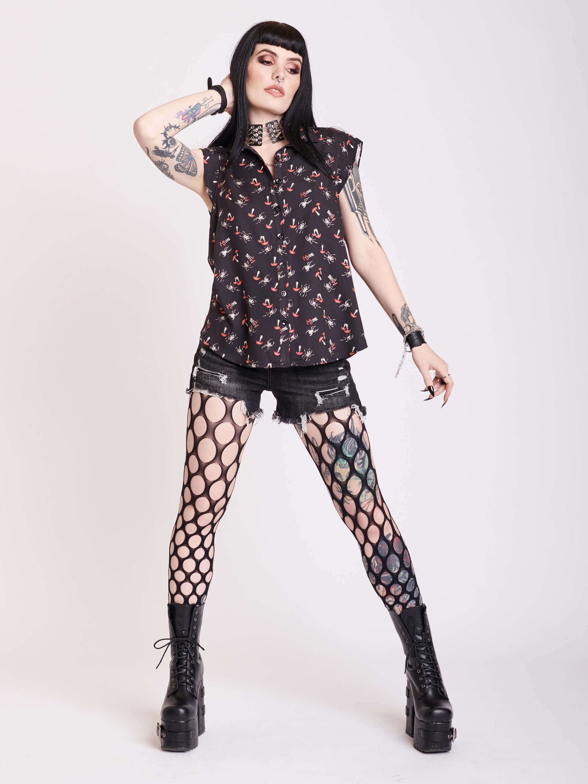 black sleevless button up top with scorpian and mushroom print