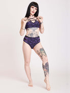 Black and purple bat print bikini top with pentagram strap detail