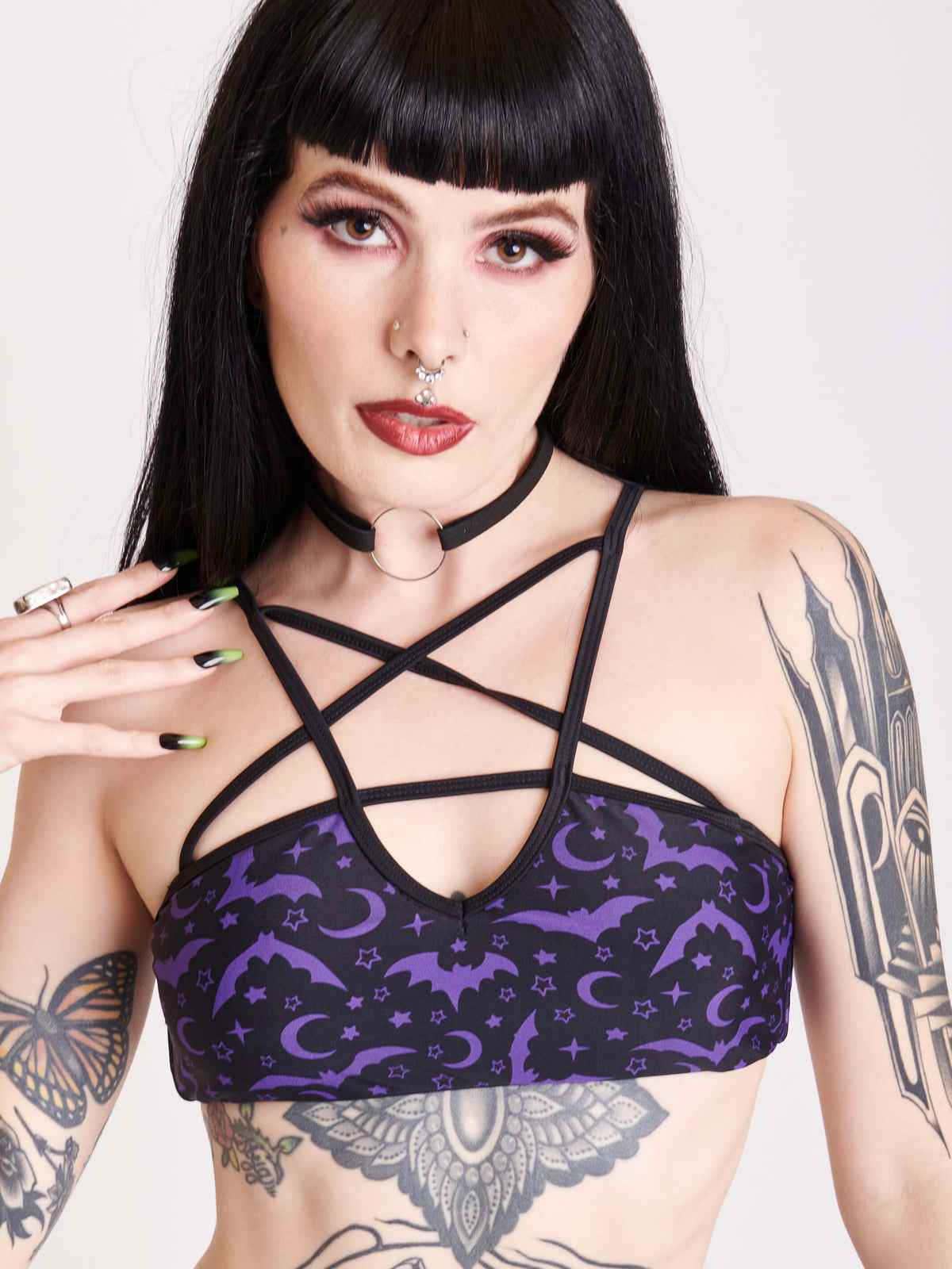 Black and purple bat print bikini top with pentagram strap detail
