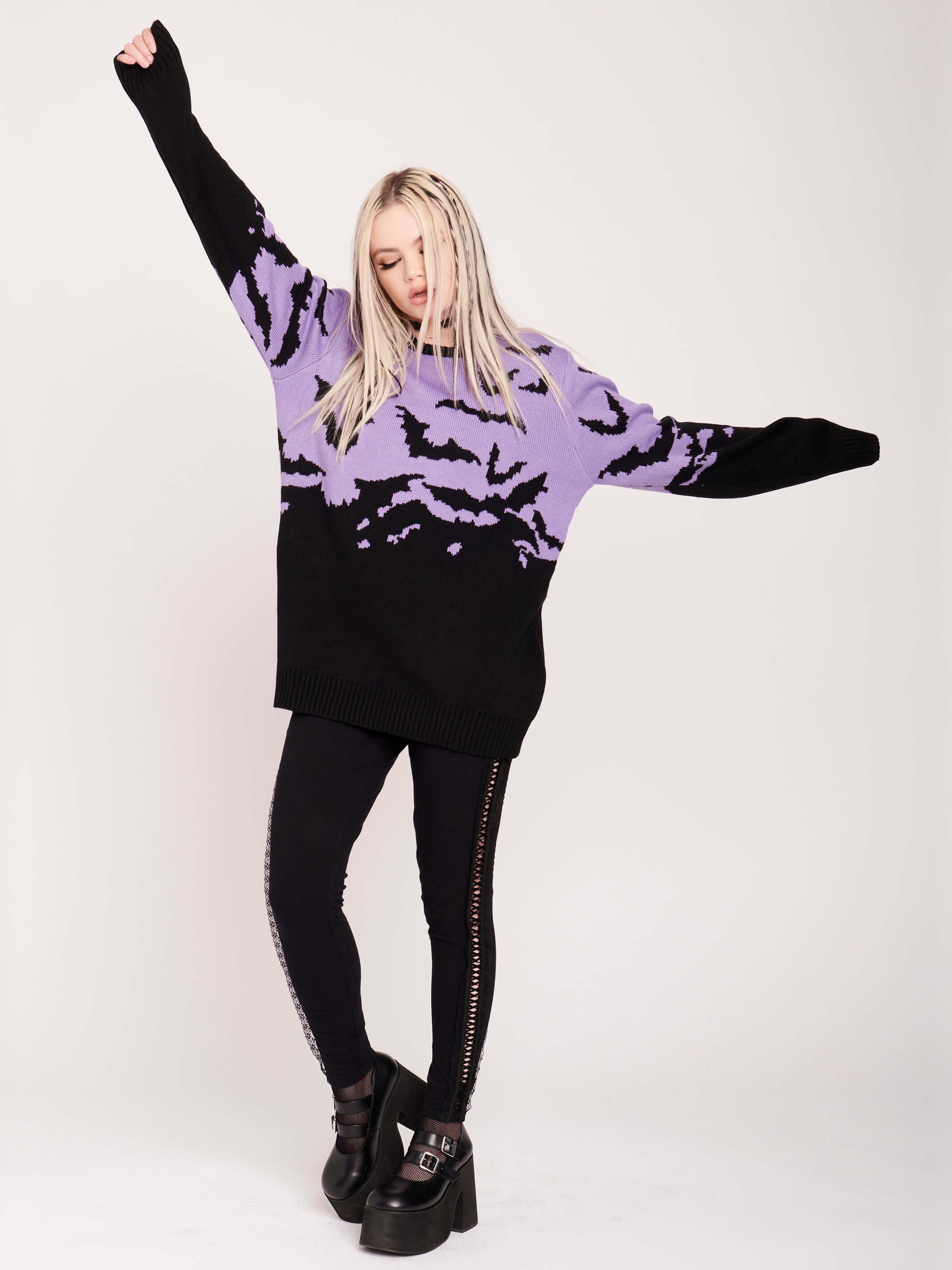 Release the bats in this warm & cozy unisex boyfriend fit intarsia sweater.