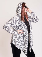 Super soft and flowy brushed knit hooded cardigan.